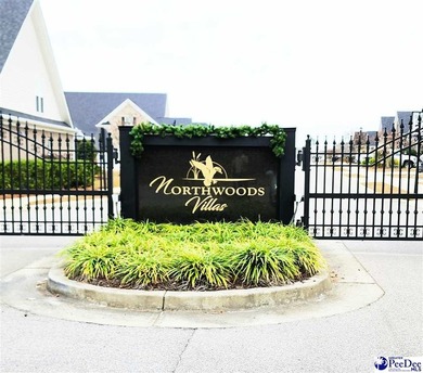 Experience peaceful luxury living at 309 Dormie Lane, located on The Members Club At Woodcreek in South Carolina - for sale on GolfHomes.com, golf home, golf lot