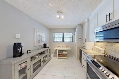 Welcome to this thoughtfully updated home on the second floor on Old Marsh Golf Club in Florida - for sale on GolfHomes.com, golf home, golf lot