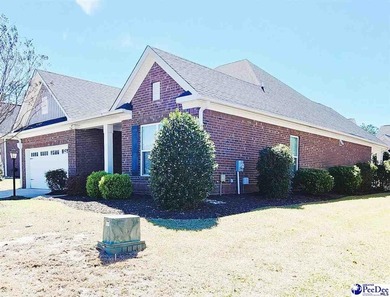 Experience peaceful luxury living at 309 Dormie Lane, located on The Members Club At Woodcreek in South Carolina - for sale on GolfHomes.com, golf home, golf lot