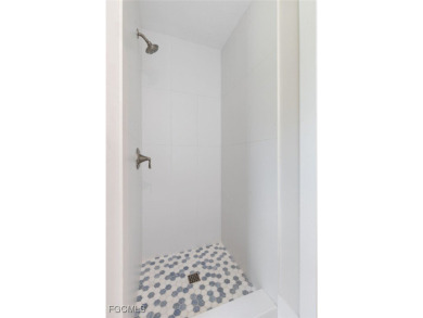 Walk one block to the beach! This stunning home has been on Beachview Golf Club in Florida - for sale on GolfHomes.com, golf home, golf lot