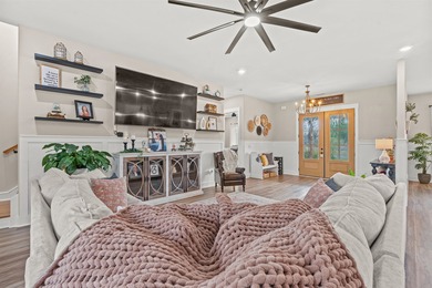 Set behind the gates of Cypress River Plantation, this modern on Heron Point Golf Club in South Carolina - for sale on GolfHomes.com, golf home, golf lot