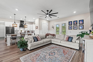 Set behind the gates of Cypress River Plantation, this modern on Heron Point Golf Club in South Carolina - for sale on GolfHomes.com, golf home, golf lot