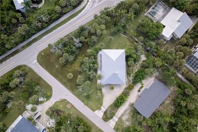 Walk one block to the beach! This stunning home has been on Beachview Golf Club in Florida - for sale on GolfHomes.com, golf home, golf lot