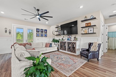 Set behind the gates of Cypress River Plantation, this modern on Heron Point Golf Club in South Carolina - for sale on GolfHomes.com, golf home, golf lot