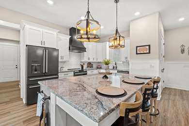 Set behind the gates of Cypress River Plantation, this modern on Heron Point Golf Club in South Carolina - for sale on GolfHomes.com, golf home, golf lot