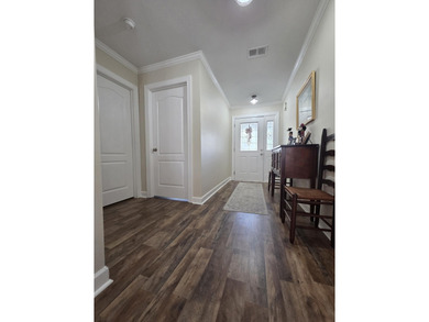 Welcome to this beautiful home on Wyboo Golf Course. New on Players Course At Wyboo Plantation in South Carolina - for sale on GolfHomes.com, golf home, golf lot