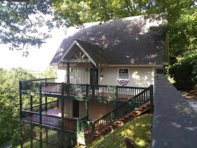 The most adorable, all wood, cabin with a magnificent view in on Sky Valley Resort and Country Club in Georgia - for sale on GolfHomes.com, golf home, golf lot