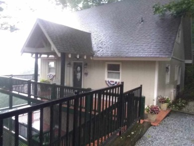 The most adorable, all wood, cabin with a magnificent view in on Sky Valley Resort and Country Club in Georgia - for sale on GolfHomes.com, golf home, golf lot