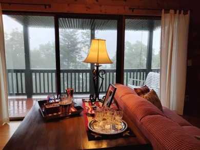 The most adorable, all wood, cabin with a magnificent view in on Sky Valley Resort and Country Club in Georgia - for sale on GolfHomes.com, golf home, golf lot