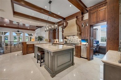 From the moment you enter, this home's expansive windows on Grey Oaks Golf and Country Club in Florida - for sale on GolfHomes.com, golf home, golf lot