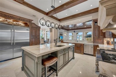 From the moment you enter, this home's expansive windows on Grey Oaks Golf and Country Club in Florida - for sale on GolfHomes.com, golf home, golf lot