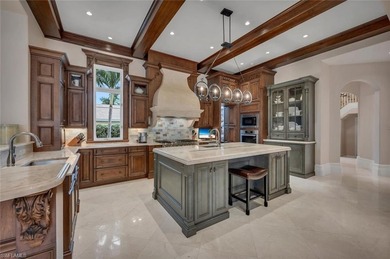 From the moment you enter, this home's expansive windows on Grey Oaks Golf and Country Club in Florida - for sale on GolfHomes.com, golf home, golf lot