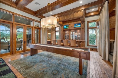 From the moment you enter, this home's expansive windows on Grey Oaks Golf and Country Club in Florida - for sale on GolfHomes.com, golf home, golf lot