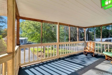 This spacious doublewide offers new  laminate flooring and on River Ridge Golf Club in Virginia - for sale on GolfHomes.com, golf home, golf lot