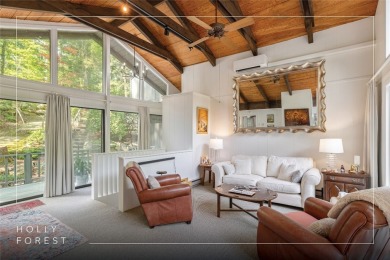 Discover a captivating retreat in Holly Forest with this classic on Sapphire National Golf Club in North Carolina - for sale on GolfHomes.com, golf home, golf lot