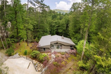Discover a captivating retreat in Holly Forest with this classic on Sapphire National Golf Club in North Carolina - for sale on GolfHomes.com, golf home, golf lot