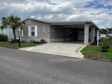 Charming and Light-Filled - This Beautiful Home Boasts an on Four Lakes Golf Club in Florida - for sale on GolfHomes.com, golf home, golf lot