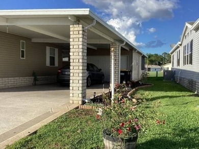 Charming and Light-Filled - This Beautiful Home Boasts an on Four Lakes Golf Club in Florida - for sale on GolfHomes.com, golf home, golf lot