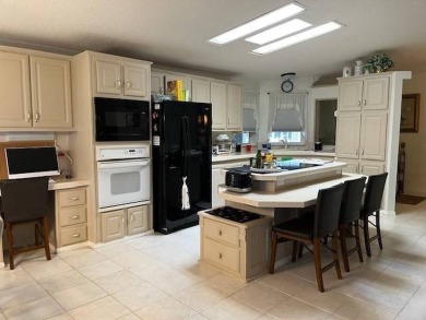 Charming and Light-Filled - This Beautiful Home Boasts an on Four Lakes Golf Club in Florida - for sale on GolfHomes.com, golf home, golf lot