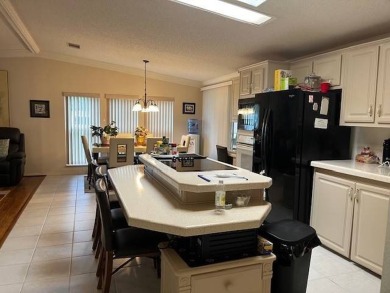 Charming and Light-Filled - This Beautiful Home Boasts an on Four Lakes Golf Club in Florida - for sale on GolfHomes.com, golf home, golf lot