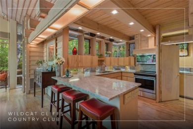 Discover a bright and airy home in Wildcat Cliffs Country Club on Wildcat Cliffs Country Club in North Carolina - for sale on GolfHomes.com, golf home, golf lot