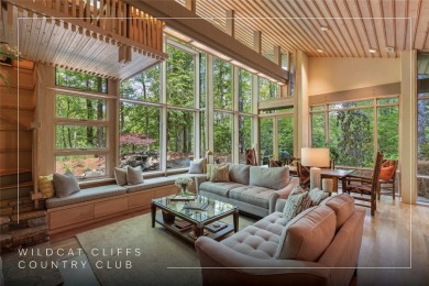Discover a bright and airy home in Wildcat Cliffs Country Club on Wildcat Cliffs Country Club in North Carolina - for sale on GolfHomes.com, golf home, golf lot