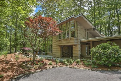 Discover a bright and airy home in Wildcat Cliffs Country Club on Wildcat Cliffs Country Club in North Carolina - for sale on GolfHomes.com, golf home, golf lot