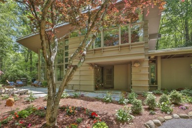 Discover a bright and airy home in Wildcat Cliffs Country Club on Wildcat Cliffs Country Club in North Carolina - for sale on GolfHomes.com, golf home, golf lot