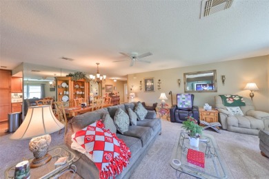 Located in an established neighborhood, this home eludes warmth on Falcon Watch Golf Club in Florida - for sale on GolfHomes.com, golf home, golf lot