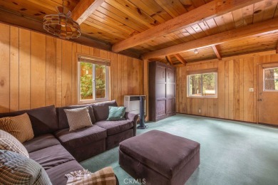 Enveloped by a quiet grove of mature pines and backing to a on Big Bear Mountain Ski and Golf Resort in California - for sale on GolfHomes.com, golf home, golf lot