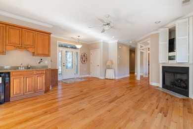 Experience refined living at 311 Katy Lane, perfectly positioned on Monticello Golf Club At Savannah Lakes in South Carolina - for sale on GolfHomes.com, golf home, golf lot