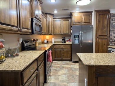 Nestled in a highly sought-after area just minutes from Cypress on Cypress Bend Golf Resort in Louisiana - for sale on GolfHomes.com, golf home, golf lot