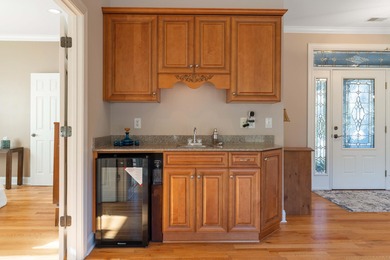 Experience refined living at 311 Katy Lane, perfectly positioned on Monticello Golf Club At Savannah Lakes in South Carolina - for sale on GolfHomes.com, golf home, golf lot