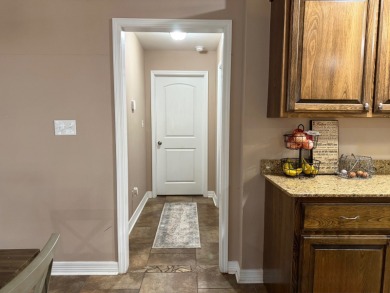 Nestled in a highly sought-after area just minutes from Cypress on Cypress Bend Golf Resort in Louisiana - for sale on GolfHomes.com, golf home, golf lot