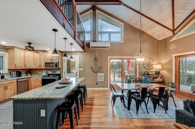 Stunning Roamingwood Lakefront Retreat in The Hideout - Fully on The Hideout Golf in Pennsylvania - for sale on GolfHomes.com, golf home, golf lot