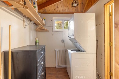 Enveloped by a quiet grove of mature pines and backing to a on Big Bear Mountain Ski and Golf Resort in California - for sale on GolfHomes.com, golf home, golf lot