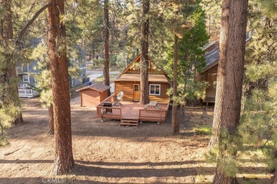Enveloped by a quiet grove of mature pines and backing to a on Big Bear Mountain Ski and Golf Resort in California - for sale on GolfHomes.com, golf home, golf lot