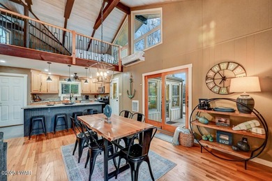 Stunning Roamingwood Lakefront Retreat in The Hideout - Fully on The Hideout Golf in Pennsylvania - for sale on GolfHomes.com, golf home, golf lot