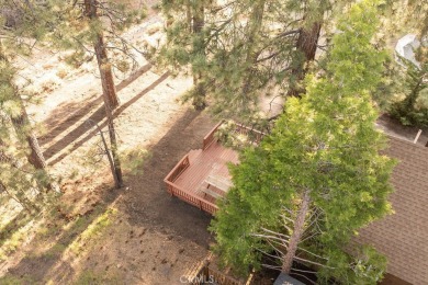 Enveloped by a quiet grove of mature pines and backing to a on Big Bear Mountain Ski and Golf Resort in California - for sale on GolfHomes.com, golf home, golf lot