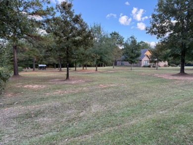 Nestled in a highly sought-after area just minutes from Cypress on Cypress Bend Golf Resort in Louisiana - for sale on GolfHomes.com, golf home, golf lot