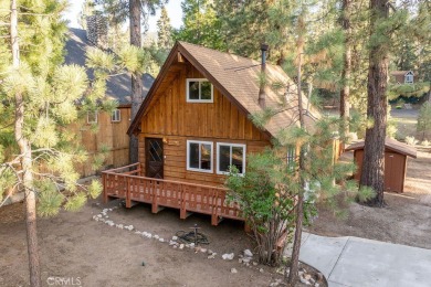 Enveloped by a quiet grove of mature pines and backing to a on Big Bear Mountain Ski and Golf Resort in California - for sale on GolfHomes.com, golf home, golf lot