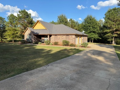 Nestled in a highly sought-after area just minutes from Cypress on Cypress Bend Golf Resort in Louisiana - for sale on GolfHomes.com, golf home, golf lot