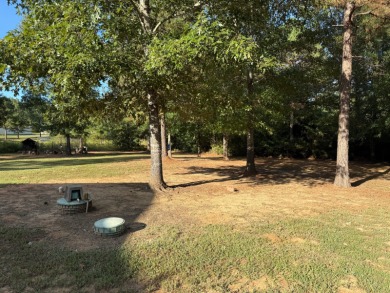 Nestled in a highly sought-after area just minutes from Cypress on Cypress Bend Golf Resort in Louisiana - for sale on GolfHomes.com, golf home, golf lot
