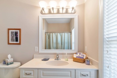 Experience refined living at 311 Katy Lane, perfectly positioned on Monticello Golf Club At Savannah Lakes in South Carolina - for sale on GolfHomes.com, golf home, golf lot