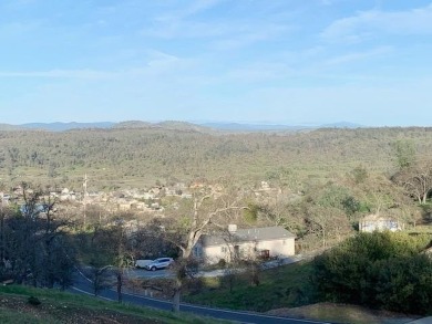 Ready to build lot with Peek-a-Boo views of the lake and on The Club at Copper Valley Golf Course in California - for sale on GolfHomes.com, golf home, golf lot