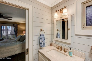 Stunning Roamingwood Lakefront Retreat in The Hideout - Fully on The Hideout Golf in Pennsylvania - for sale on GolfHomes.com, golf home, golf lot