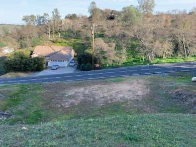 Ready to build lot with Peek-a-Boo views of the lake and on The Club at Copper Valley Golf Course in California - for sale on GolfHomes.com, golf home, golf lot