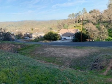 Ready to build lot with Peek-a-Boo views of the lake and on The Club at Copper Valley Golf Course in California - for sale on GolfHomes.com, golf home, golf lot