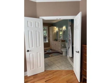 Experience refined living at 311 Katy Lane, perfectly positioned on Monticello Golf Club At Savannah Lakes in South Carolina - for sale on GolfHomes.com, golf home, golf lot