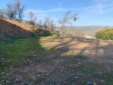 Ready to build lot with Peek-a-Boo views of the lake and on The Club at Copper Valley Golf Course in California - for sale on GolfHomes.com, golf home, golf lot